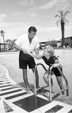 Judy Holliday and Peter Lawford