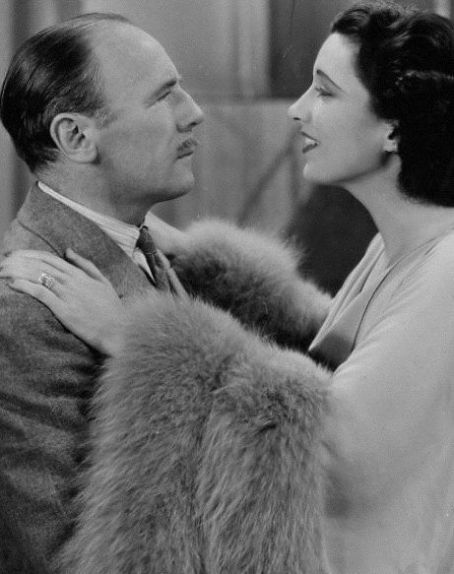 Roland Young and Kay Francis