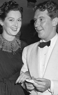 Burgess Meredith and Rosalind Russell