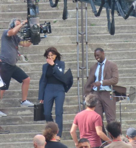 Nathalie Emmanuel – On the set of ‘THE KILLER’ in Paris - FamousFix