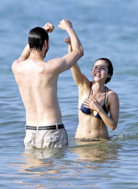 Keanu Reeves and China Chow Photos.