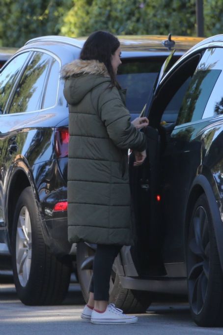 Mila Kunis – Out in olive green puffer jacket in Beverly Hills