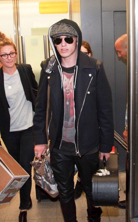 Lily Collins and Jamie Campbell Bower arriving in Berlin (August 20)