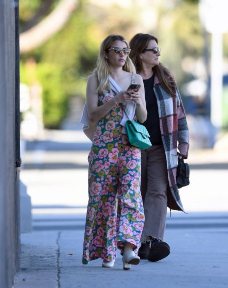 Emma Roberts – In a floral dress shopping with her mother in Los Angeles
