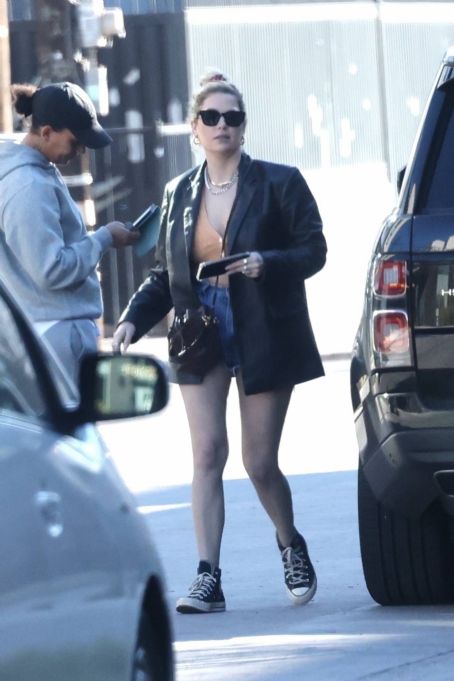 Ashley Benson – In a leather coat and denim shorts outing in Studio City