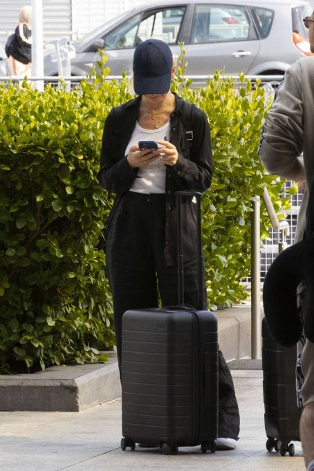 Lily James – Seen with boyfriend Michael Shuman heads out of London