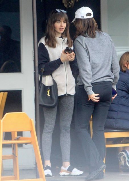Lily Collins – Seen with Oliver Cooper and friends in Beverly Hills