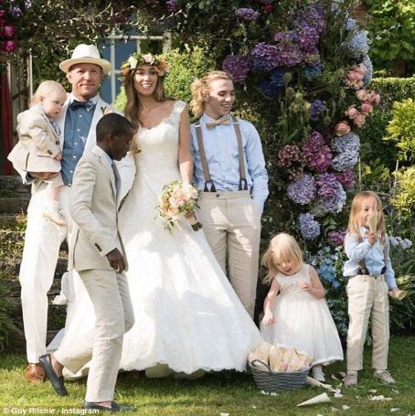 Mr and Mrs Ritchie's wedding album: Beautiful bride Jacqui poses with new husband Guy, their three children and Madonna's boys Rocco and David in family photos from lavish three day nuptials