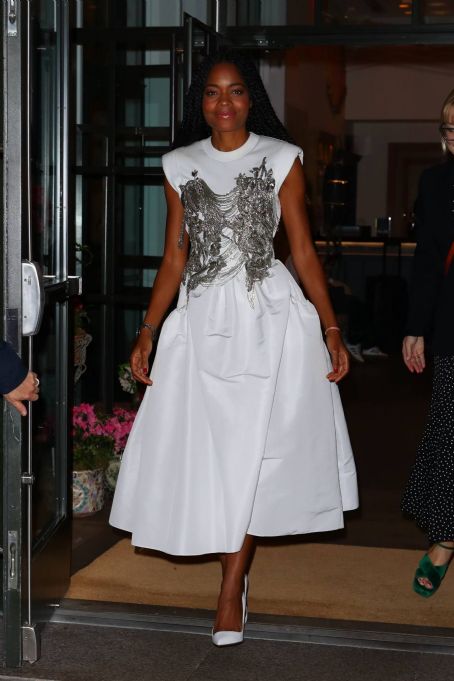 Naomie Harris – In an all-white dress at Omega 5th Avenue in New York
