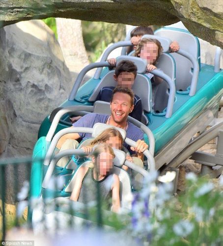 A rush of blood to the head! Chris Martin treats his children Apple and Moses to a rollercoaster-filled day at Disneyland