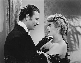 John Wayne and Joan Blondell