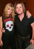 Jennifer Mallini and Billy Duffy
