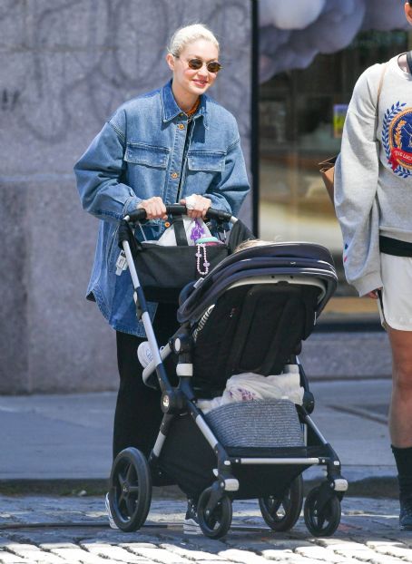 Gigi Hadid – Looks happy while out on a stroll in New York
