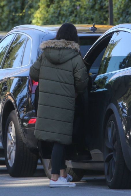 Mila Kunis – Out in olive green puffer jacket in Beverly Hills