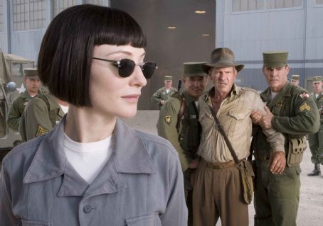 Cate Blanchett (left), as the villainous Irina Spalko, is determined to beat Indiana Jones (Harrison Ford, right) in finding the Crystal Skull in 'Indiana Jones and the Kingdom of the Crystal Skull.' Photo Credit: David James. ™ & © 2008 Lucasfilm