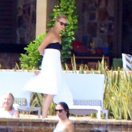 Charlize Theron in Black Swimsuit on vacation in Los Cabos | Charlize ...