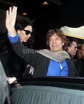 Mick Jagger and L'Wren Scott leaving their hotel for Rolling Stones concert in New Jersey - 15 December 2012