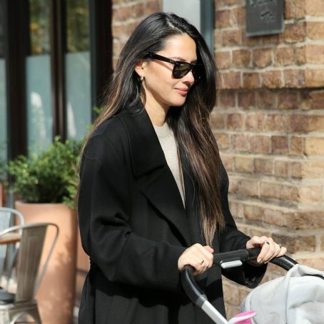 Olivia Munn – Seen with Uppababy stroller in New York City
