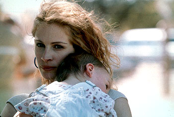 Julia Roberts stars as Erin Brockovich, a twice-divorced mother of ...