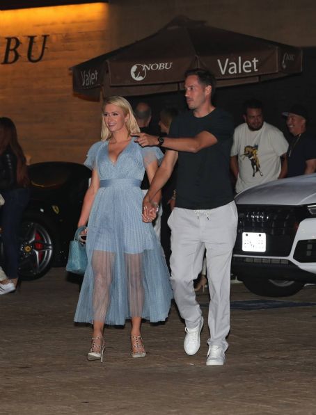 Paris Hilton – Out in a baby blue dress in Malibu