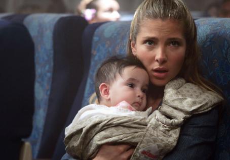 Elsa Pataky stars as “Maria” in New Line Cinema’s intense action feature Snakes On A Plane. Photo Credit: James Dittiger 2005/New Line Productions