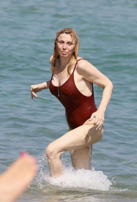 Courtney Love in Red Swimsuit in Saint Tropez FamousFix post