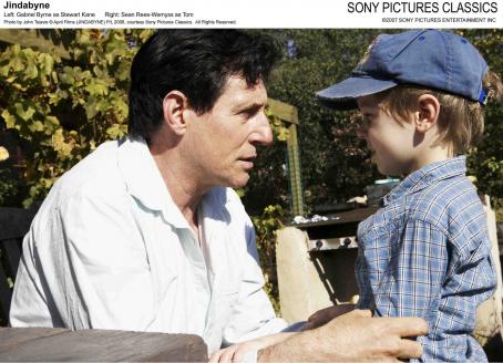 Left: Gabriel Byrne as Stewart Kane; Right: Sean Rees-Wemyss as Tom. Photo by John Tsiavis © April Films (JINDABYNE) P/L 2006, courtesy Sony Pictures Classics. All Right Reserved.