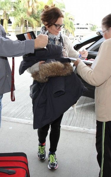 Tina Fey departing on a flight at LAX airport in Los Angeles ...