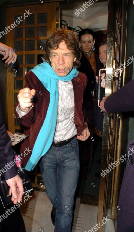 Mick Jagger and L'Wren Scott leaving the Ivy restaurant, London - 1 December 2004