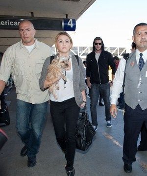 Miley Cyrus was spotted catching a departing flight out of the Los Angeles International Airport today, September 27
