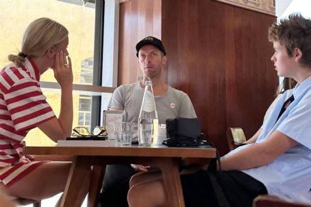 Gwyneth Paltrow – With her former husband Chris Martin and son Moses at Bar Luce in Milan