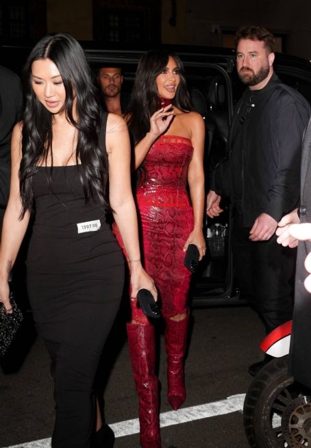 Kim Kardashian – In a red ensemble at the Dolce Gabbana party – Fashion Week in Milan