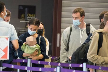 Alicia Vikander – With Michael Fassbender and their newborn at Paris-Charles de Gaulle airport