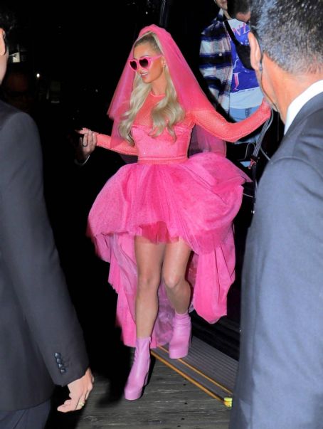 Paris Hilton – In neon pink bridal outfit at wedding after party at the Santa Monica Pier