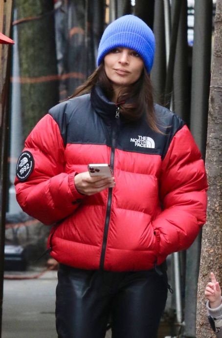Emily Ratajkowski – In a red puffer jacket while out in New York