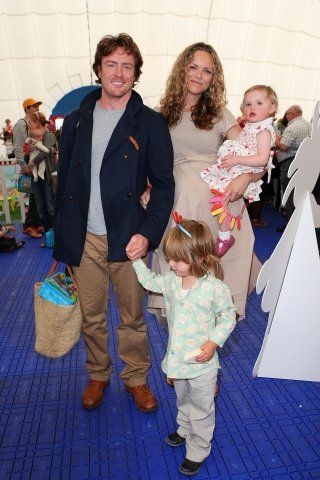 Happily married husband and wife: Toby Stephens and Anna-Louise Plowman with their children