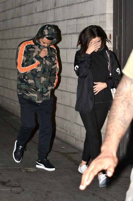 Selena Gomez with The Weeknd at The Grove in West Hollywood