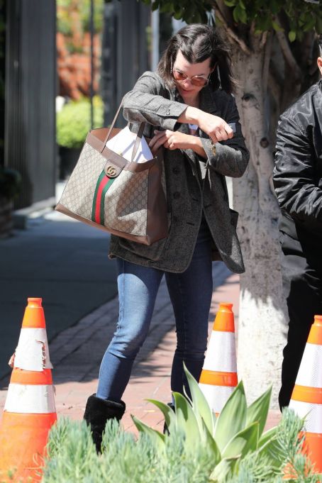 Milla Jovovich – Shopping candids on Melrose Place in West Hollywood