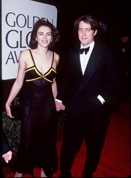 Hugh Grant and Elizabeth Hurley At The 52nd Annual Golden Globe Awards (1995)