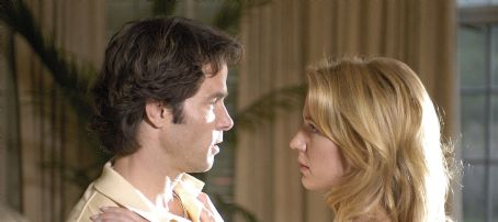 Poppy Montgomery and Shawn Christian