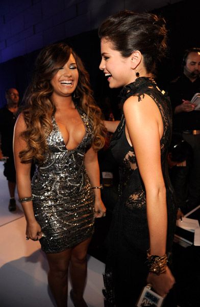 Demi Lovato and Selena Gomez at the 2011 MTV Video Music Awards this evening, August 28, held at the Nokia Theatre L.A. LIVE  in Los Angeles, California