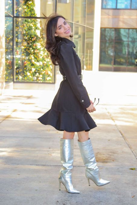 Sofia Carson in silver boots in New York