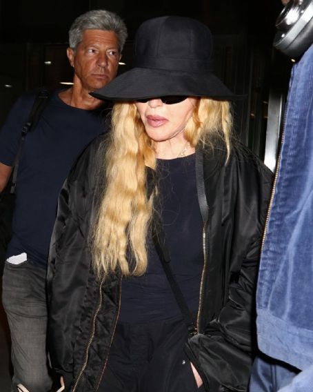 Madonna  wore a wide-brimmed hat at JFK Airport in New York
