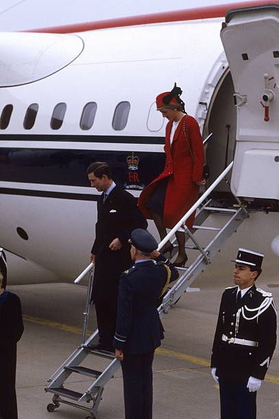 Prince Charles and Princess Diana are welcomed by French Prime minister Michel Rocard at Orly airport on November 7, 1988 as they arrive for a five-day official visit in France