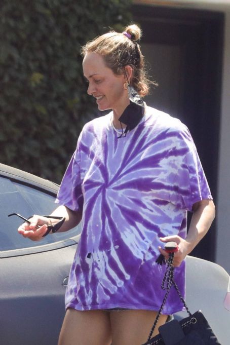 Amber Valletta – In an oversized tie-dye tee while out in Los Angeles