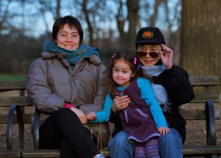 Little Emi Helfrich with mum Kyoko Helfrich and grandmother Yoko Ono