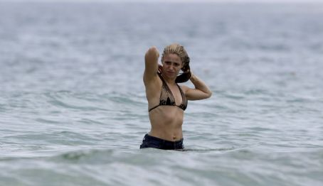 Shakira and her family on a beach in Ibiza, Spain