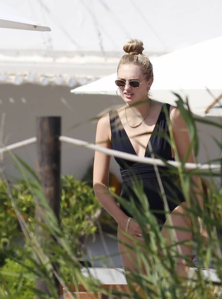 Romee Strijd – Spotted in black one-piece swimsuit in Ibiza