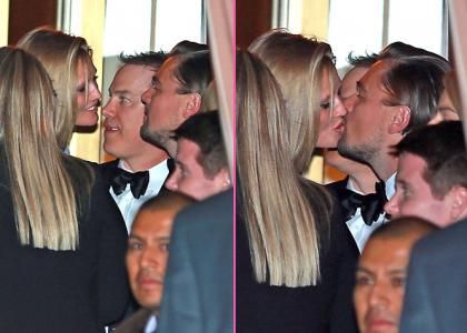 Leonardo DiCaprio and Toni Garrn sharing a kiss at the CAA Golden Globes After Party at the Sunset Towers in West Hollywood (January 12)