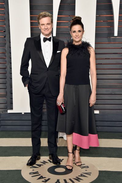 Feb. 27, 2011 - Hollywood, California, U.S. - Actor COLIN FIRTH wearing a Tom  Ford tuxedo and wife LIVIA GIUGGIOLI wearing a panelled gown recycled from  old dresses for the red carpet